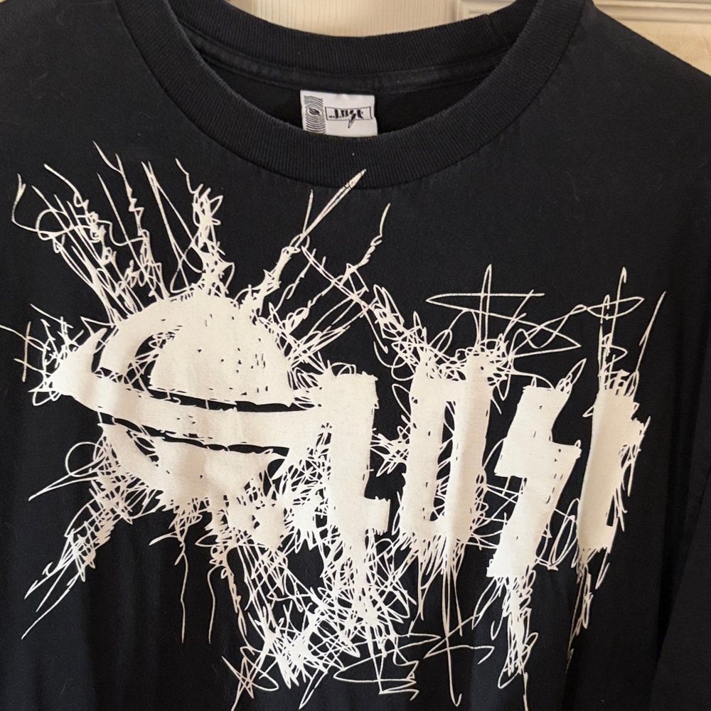 Black Graphic Tee with White Abstract Logo